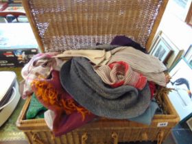 A large collection of scarves, gloves inc.