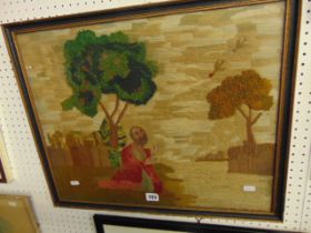 A framed tapestry,