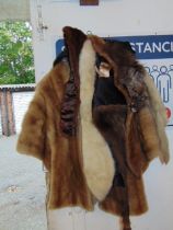 A Mink stole and other furs collars