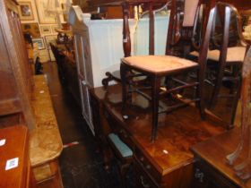 A Walnut dressing table and stool