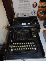 A Corona early portable typewriter