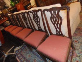 A set of eight 19th century Chippendale style chairs
