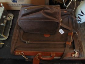 A Nubuck suit carrier and matching vanity case