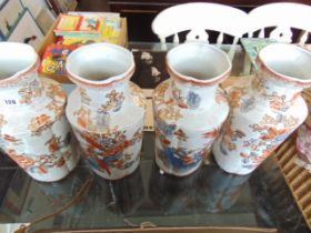 A set of four porcelain vases