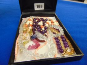 A small qty of semi precious stone necklaces (7), Coral, Amethyst, Aqua marine etc.