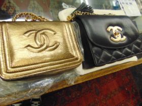 Two vintage designer style handbags