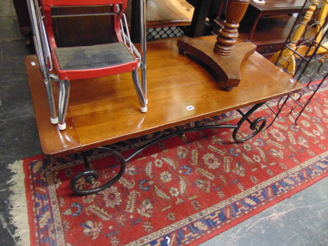 A Mahogany and wrought iron coffee table - Image 2 of 2