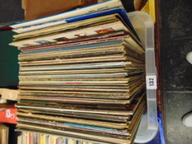 A box of assorted records,