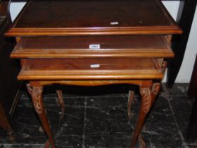 A walnut nest of three tables