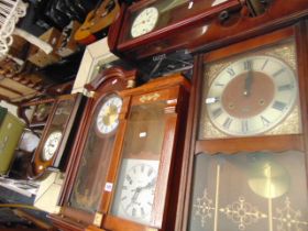 Five assorted wall clocks