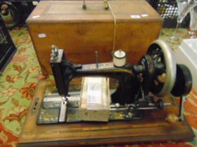 A Singer sewing machine in case