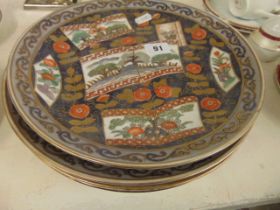 A set of four Imari plates
