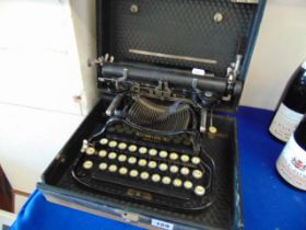 A Corona early portable typewriter