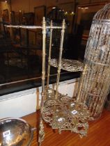 A brass butterfly design three tier plant stand