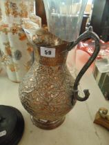 A large Copper middle eastern jug