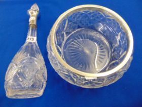 A cut glass fruit bowl with HM Silver rim and a Silver topped European 800 decanter