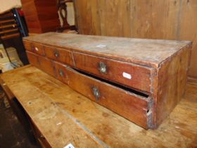 A bank of six drawers- cabinet makers