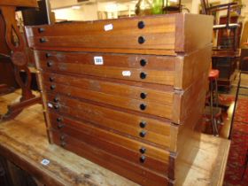 A stacking set of specimen drawers