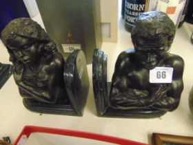 A pair of bronze and marble bookends