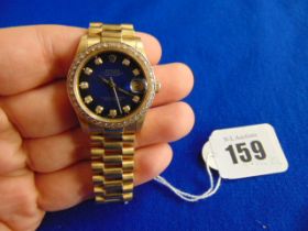 18ct Gold Rolex, Diamond bezzel, blue Diamond dial watch, in working order,