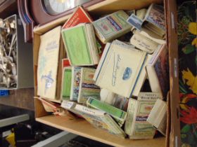 A qty of loose stamps and cigarette cards