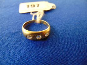 A fully hallmarked 18ct Gold three stone Diamond ring,