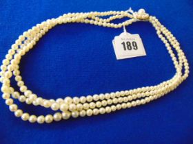 A three row Pearl necklace on 9ct GOld clasp