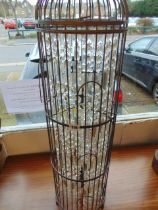 A decorative cage lamp