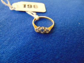 An 18ct hallmarked Gold Diamond three stone ring, total Diamond weight, .