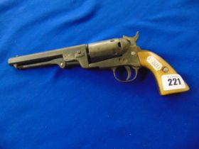 A navy Colt revolver a.