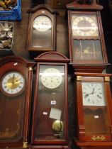 Five assorted wall clocks