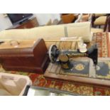 A Singer sewing machine in case