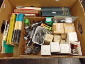 A box of vintage radio valves and a book on radio