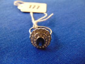 A Platinum hallmarked, Sapphire and Diamond cluster ring,