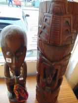 Two carved Totems