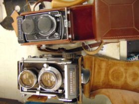 A Rolleicord camera and a Mamiya C3 camera