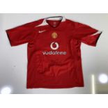 FOOTBALL MEMORABILIA - A MANCHESTER UNITED SHIRT SIGNED BY WAYNE ROONEY.
