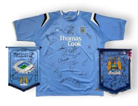 MANCHESTER CITY FC - TWO SIGNED CLUB PENNANTS AND SIGNED SHIRT.
