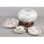 A collection of oriental ceramics. Includes Chinese planter decorated in coloured enamels, dish with