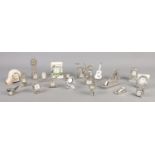 A collection of twenty-one miniature novelty quartz clocks, by Royale, Daniel David and History