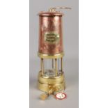 A Lamp & Limelight company brass and copper miners lamp. Also includes keyring miniature and BACM