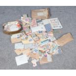 A large world stamp collection; loose and in albums. To include Netherlands, South Africa and New