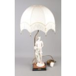 A Giuseppe Armani table lamp titled Florence. Complete with beaded fringe shade.