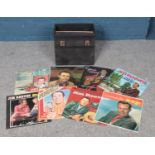 A record carry case containing a collection of Jim Reeves vinyl records. To include God Be With You,