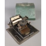 A vintage German child's tinplate typewriter.