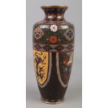 A Japanese cloisonne vase with dragon and phoenix decoration. 18cm.