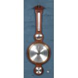 A Howard Miller banjo barometer.