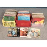 Three boxes of LP records. Includes Simon & Garfunkel, Shirley Bassey, Showaddywaddy etc.