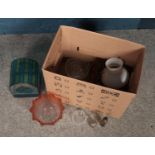 A box of assorted glassware to include medicine bottles, cut glass bowls, oil lamp shades
