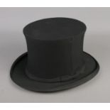 An Austin Reed collapsible top hat.